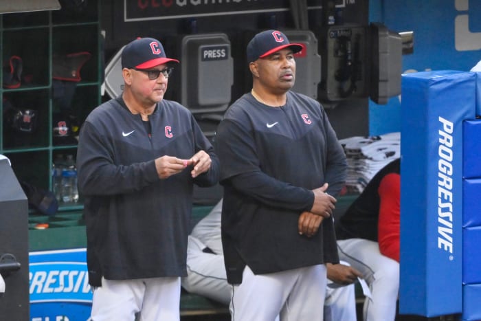 Jun 7, 2022; Cleveland, Ohio, USA; Cleveland Guardians manager Terry Francona (77) and bench coach DeMarlo Hale (30) stand in the dugout in the second inning against the Texas Rangers at Progressive Field.